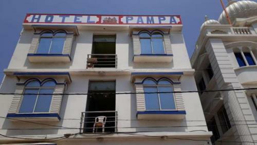 Hotel Goroomgo Sureswory Pampa Puri