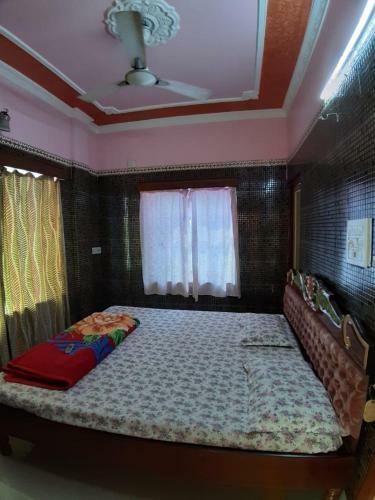Hotel Goroomgo Sureswory Pampa Puri