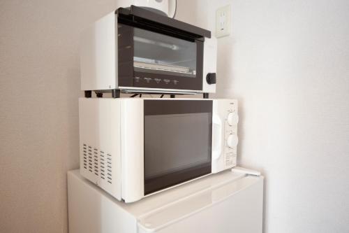 Yakuin Apartment 911