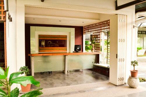 Hostal Qi Hotel And Club