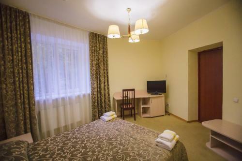 Hotel Snezhniy Bars Dombay