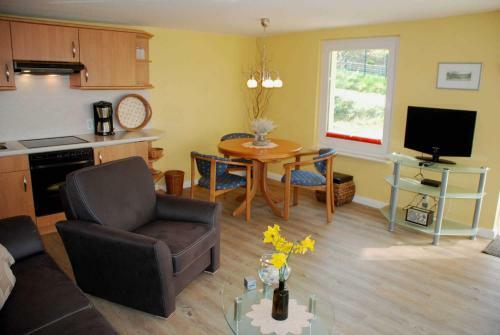 Apartamento Ferienappartements Unterm Reetdach