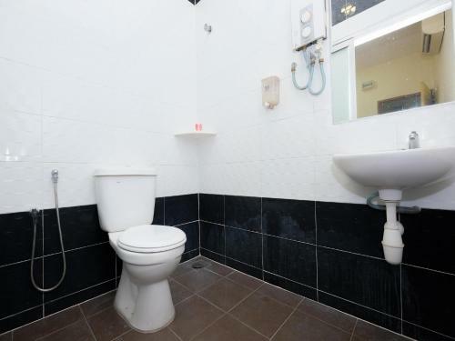 Hostal Oyo 89493 Q Hotel
