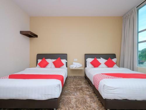 Hostal Oyo 89493 Q Hotel
