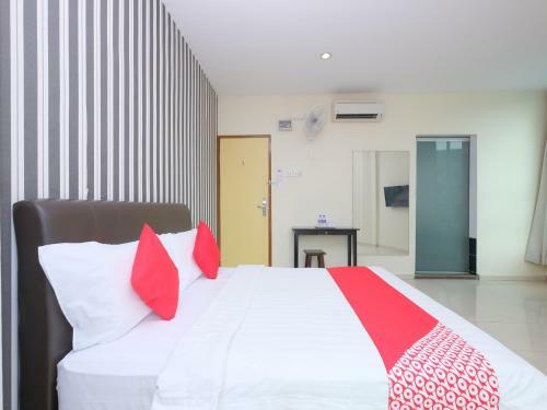 Hostal Oyo 89493 Q Hotel