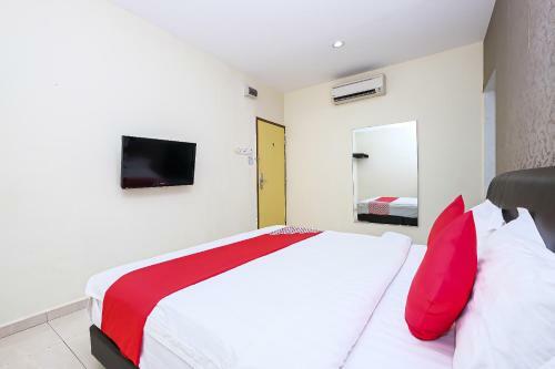 Hostal Oyo 89493 Q Hotel