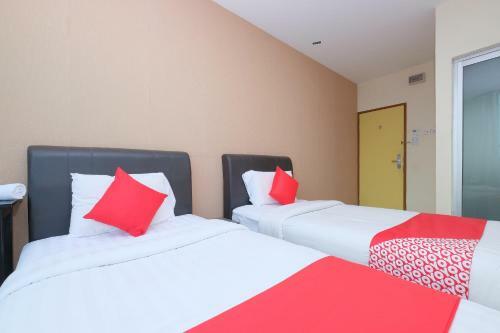Hostal Oyo 89493 Q Hotel