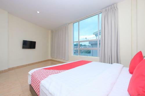 Hostal Oyo 89493 Q Hotel