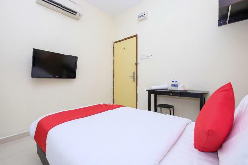 Hostal Oyo 89493 Q Hotel