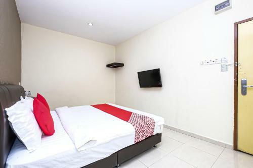 Hostal Oyo 89493 Q Hotel