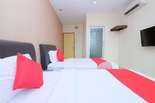 Hostal Oyo 89493 Q Hotel