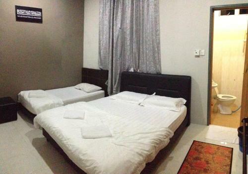 Hostal Anggun Beach Guest House