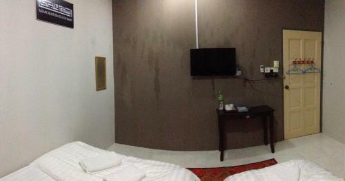 Hostal Anggun Beach Guest House