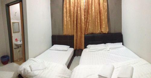 Hostal Anggun Beach Guest House