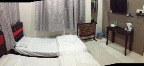 Hostal Anggun Beach Guest House