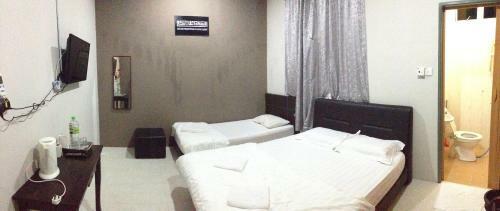 Hostal Anggun Beach Guest House
