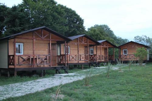 Camping "houses By The River"