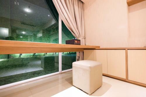 Dazzle Studio Room @ U-residence Apartment By Travelio