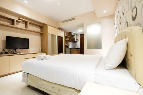 Dazzle Studio Room @ U-residence Apartment By Travelio