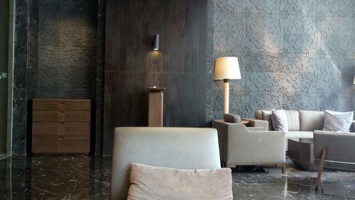 Dazzle Studio Room @ U-residence Apartment By Travelio