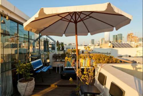 Apartamento The Rothschild Elegant Rooftop