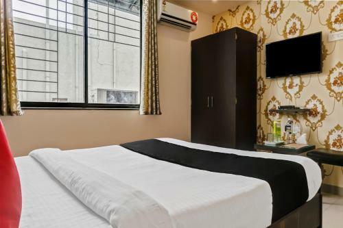 Hotel Capital O 23501 Log Inn Plaza