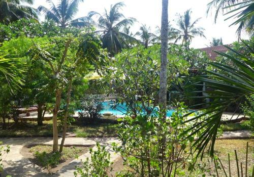 Apartamento Frangipani Cottages