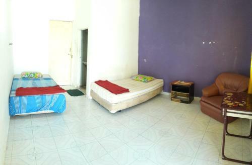 Hostal Rumah Rehat Qnm Holidays