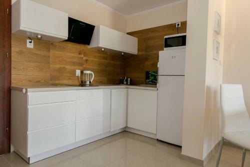 Apartamenty Sosnowe Nad Morzem ?uk?cin