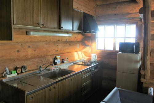 Apartamento White Tree Log House Madarao Tangram
