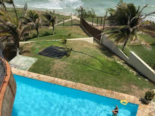 Apartamento Costeira Praia - Belo Flat II (115)