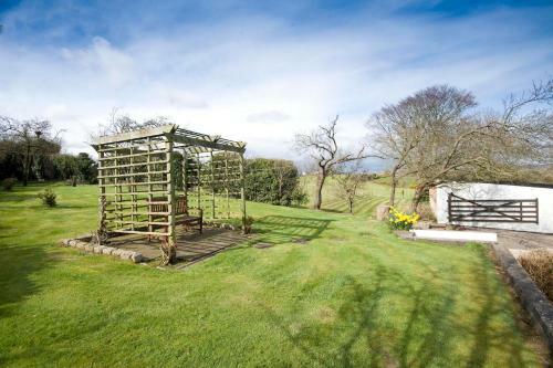 Apartamento Coach Road Cottages