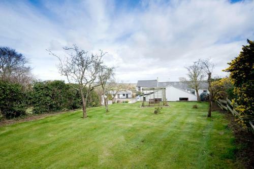 Apartamento Coach Road Cottages