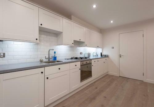 Apartamento The Broughton Mews Residence