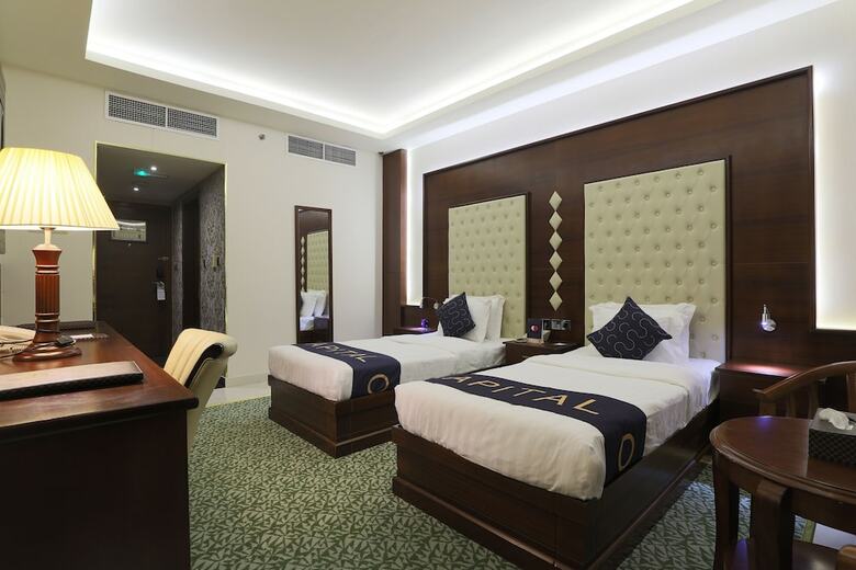 Capital O 325 Queen Palace Hotel