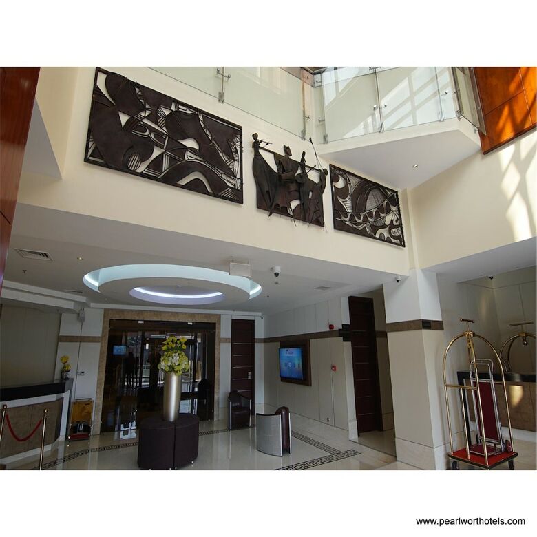 Pearlwort Hotel And Suites
