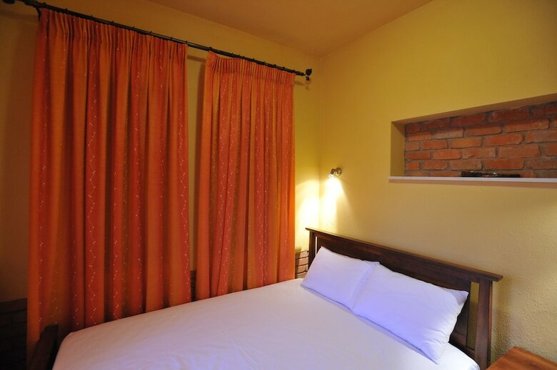 Apartamentos Symmetron Suites
