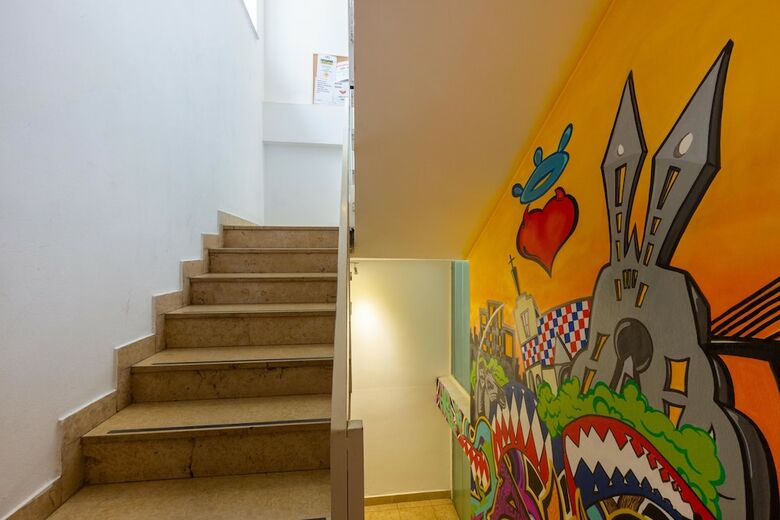Hostal Whole Wide World Hostel & Bar