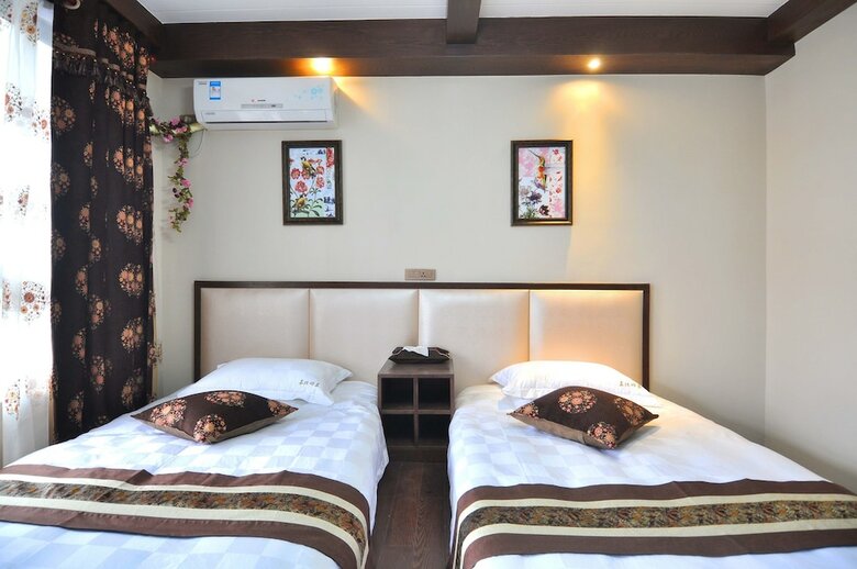 Posada Wuzhen Chenhui Impression Theme Inn