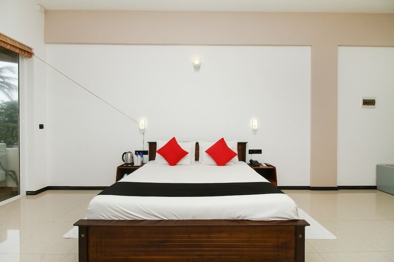 Hotel Capital O 311 Grace Beach Resort