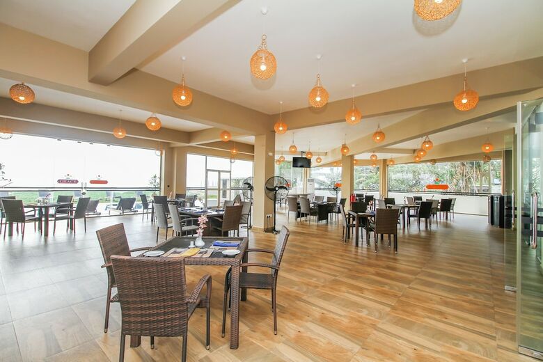 Hotel Capital O 311 Grace Beach Resort