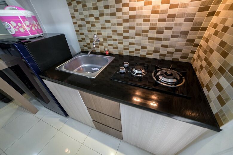 Serene & Cozy Apartment At Parahyangan Residences