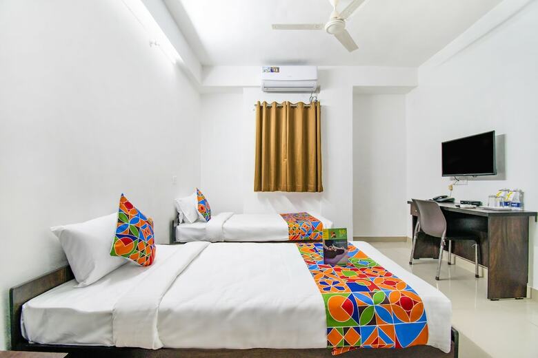 Fabhotel Purple Orchid