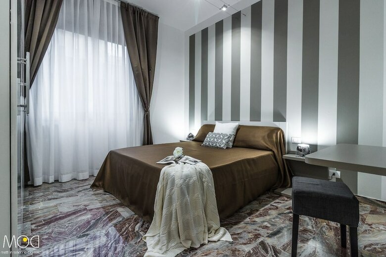 Ugo Bassi Apartments