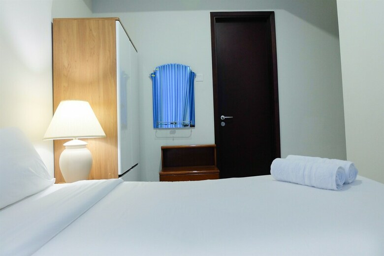 Homey And Modern 2br Puri Mansion Apartment