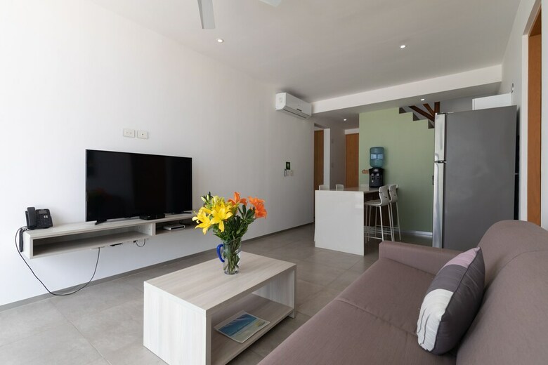 The City Condos By Playa Paradise