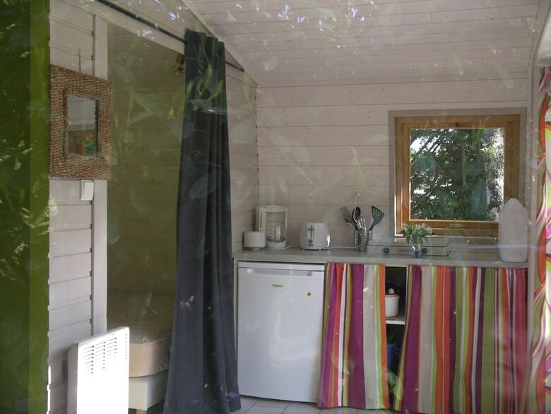 Camping Le Petit Lion - Lodges Bois