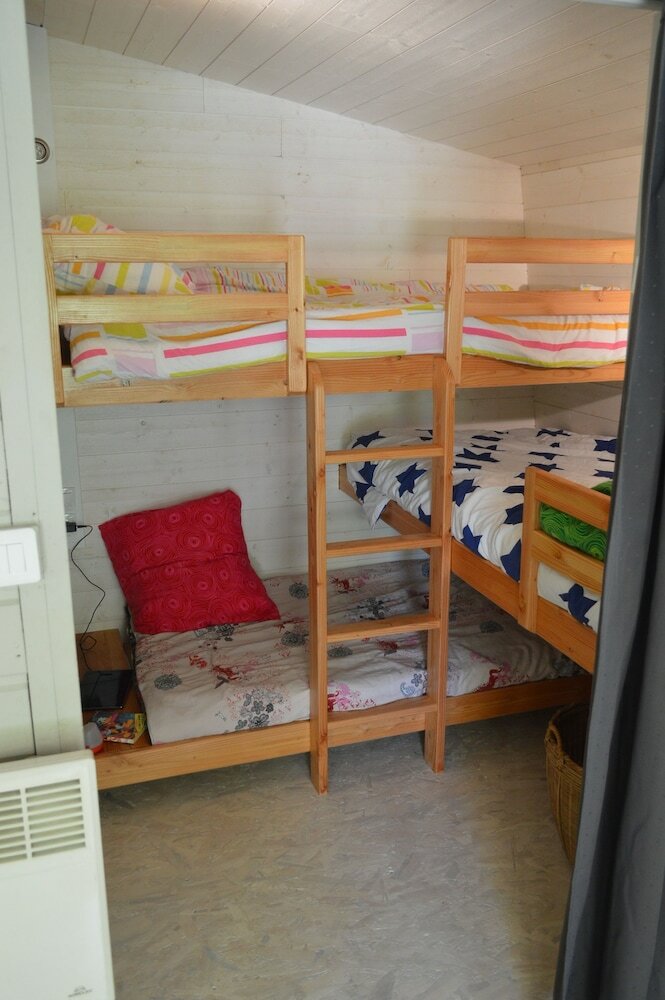 Camping Le Petit Lion - Lodges Bois