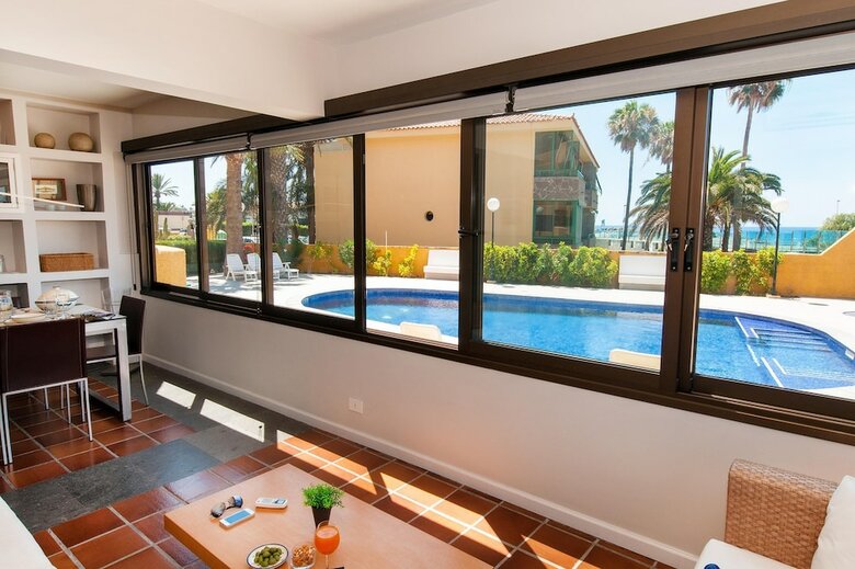 Beach Front Apartment In Playa de Las Burras Cn