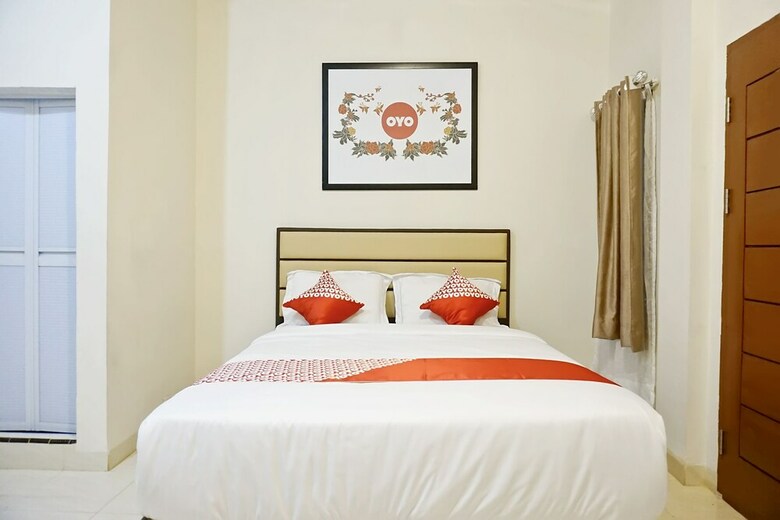 Hostal Oyo 1076 Dmc Homestay